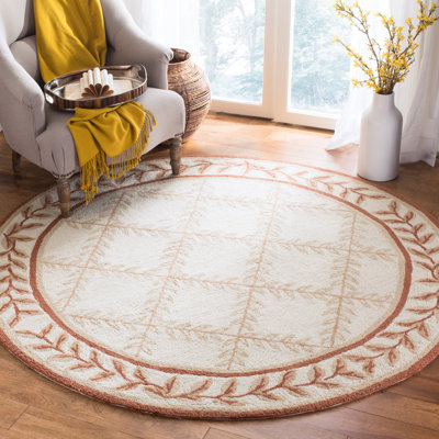 Taran Hand-Hooked Ivory/Beige Area Rug