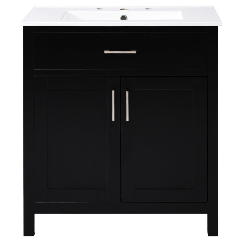 Meuble-lavabo noir de 30 pouces avec lavabo en céramique et nombreux espaces de rangement. Fabriqué en bois massif. Offre des tiroirs pratiques. Finition moderne pour une unité. Fonction de fermeture en douceur