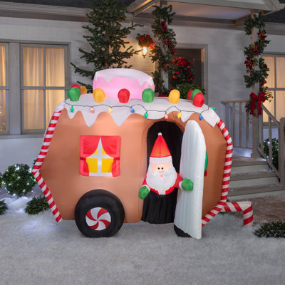 7.5 ft. Inflatable Gingerbread Trailer with Santa