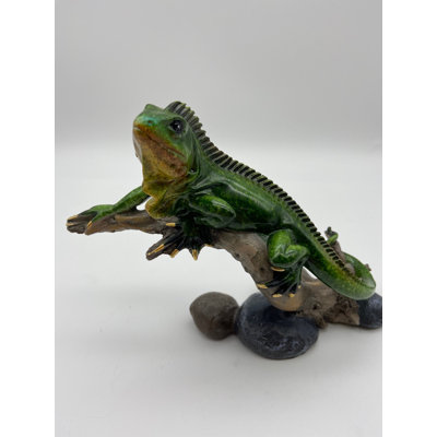 Figurine iguane sur branche