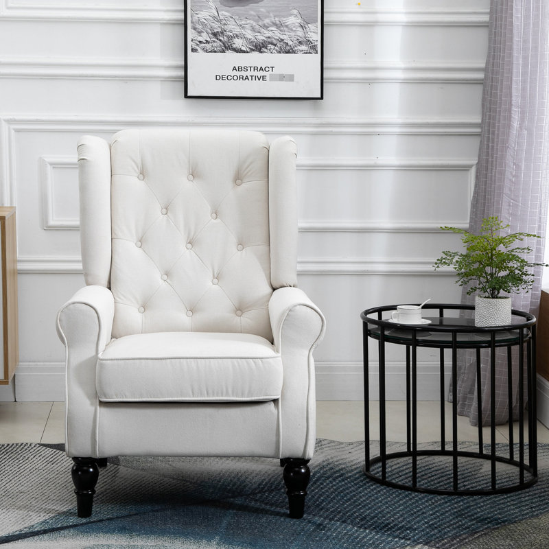 Fauteuil à oreilles confortable avec coussins capitonnés et accoudoirs arrondis pour un style de vie élégant