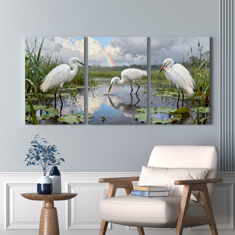 Ensemble de 3 tableaux sur toile tendue représentant un héron blanc dans une zone humide avec un arc-en-ciel