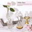 Ensemble de 36 petits vases en verre transparent de forme variée, parfaits pour décorer une table lors d'un mariage champêtre ou pour la décoration intérieure. Ces vases sont composés de bouteilles en verre vintage et sont disponibles en grande quantité. Leurs formes variées en font un choix idéal pour une décoration de table rustique ou pour la décoration de la maison.