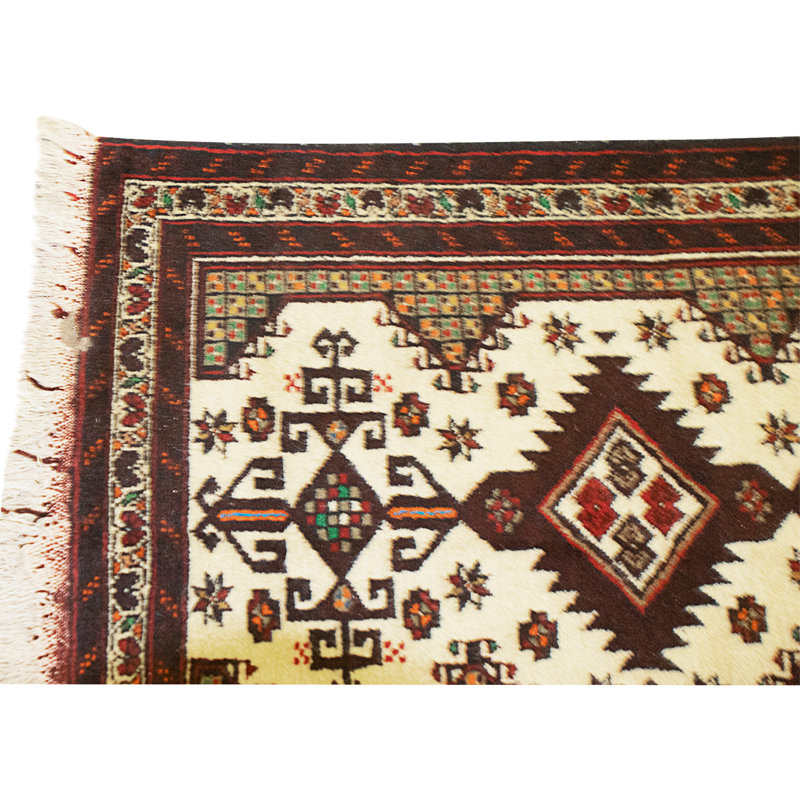 Tapis ivoire et multicolore de haute qualité noué à la main