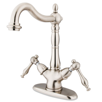 Robinet pour vasque à fixation sur comptoir à deux ou trois trous Kingston Brass Heritage