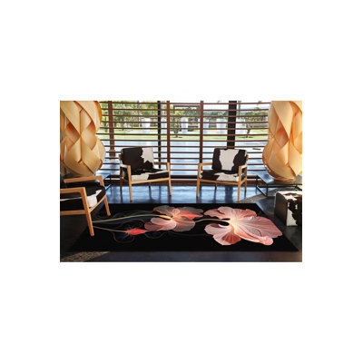Tapis noir lavable à motif tissé noir