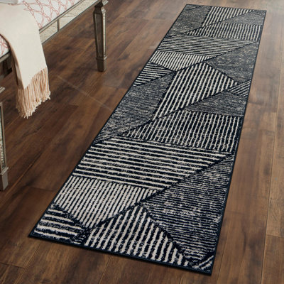 Tapis contemporain délavé à motif géométrique