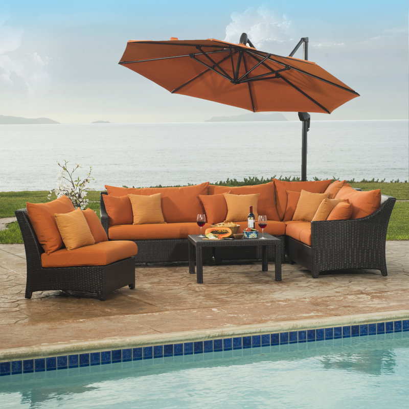 Fionnula 7 Piece Rattan Sectional Seating Group With Sunbrella Cushion Covers, Spectrum Cayenne Sunbrella® Plainweave