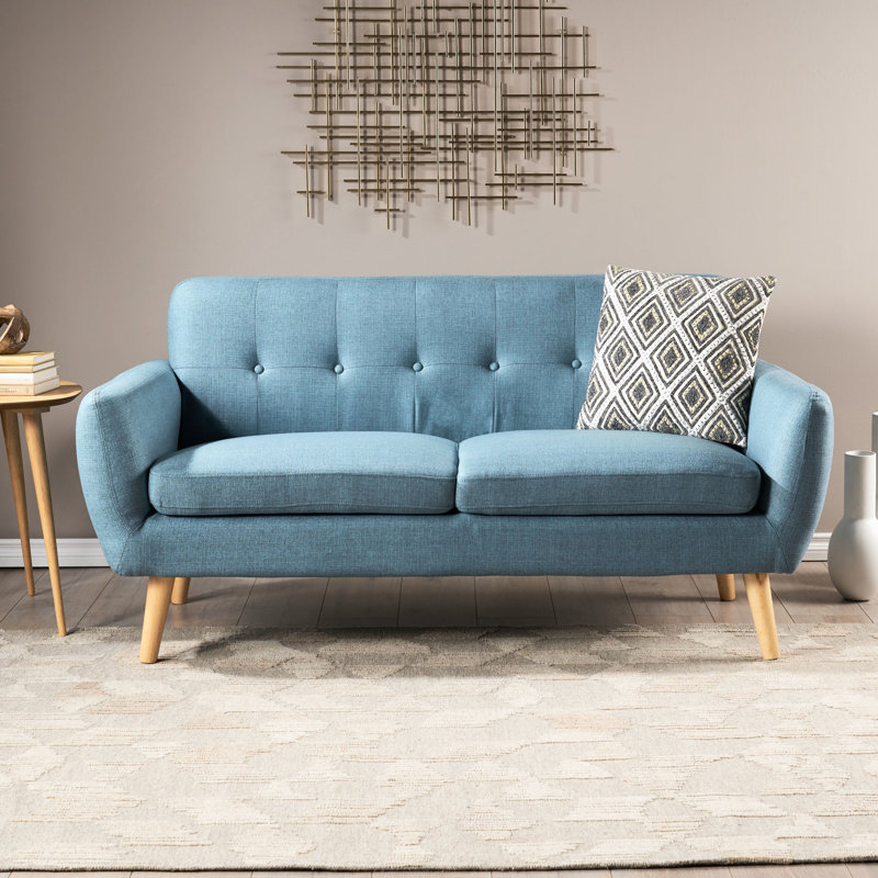 Tissu bleu élégant avec des détails pour les petits espaces de vie