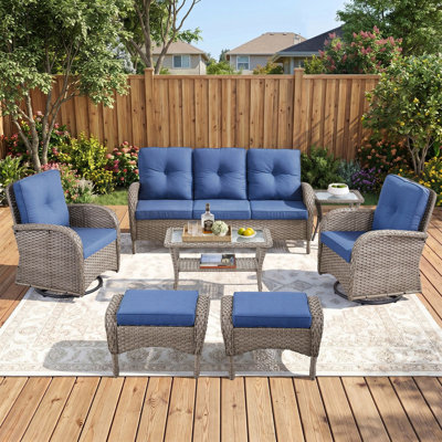 Ensemble de conversation de patio extérieur en osier 7 pièces avec des chaises pivotantes et des poufs