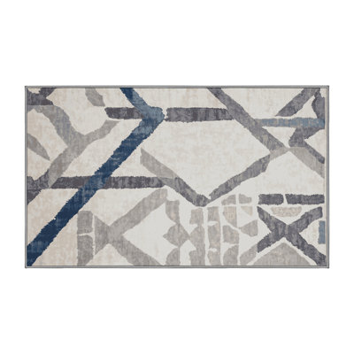Tapis gris lavable à la machine