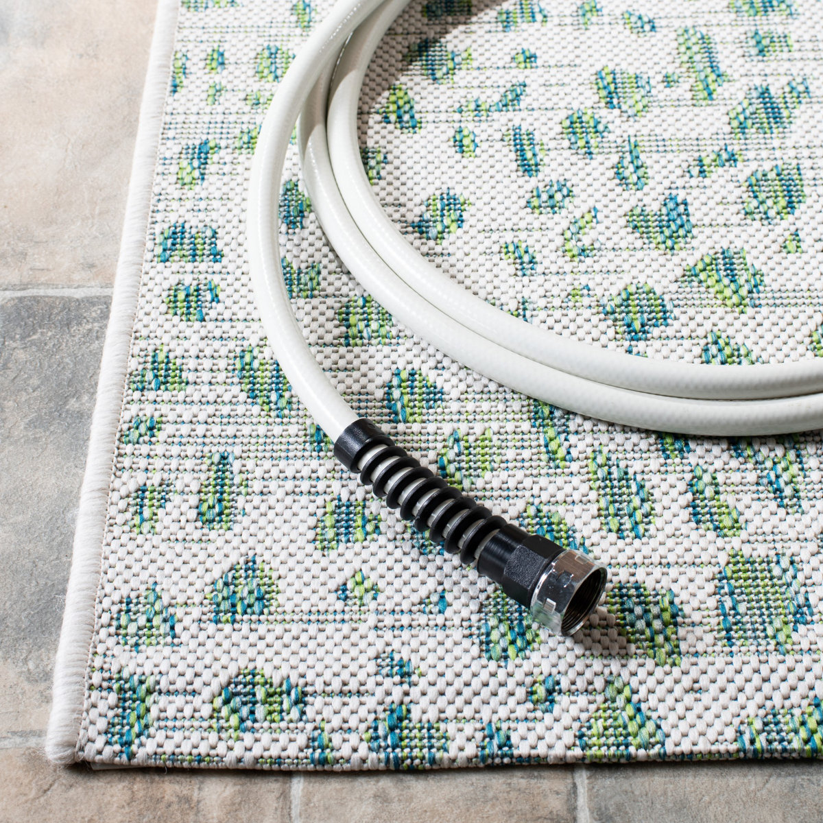 Wade Logan® Animal Print Ivory/Green Indoor / Outdoor Area Rug ...