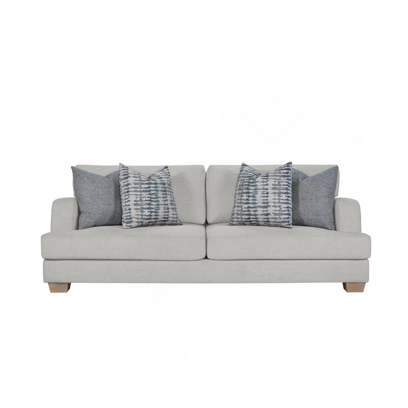 Canapé confortable avec coussins supplémentaires et fabrication durable pour la détente