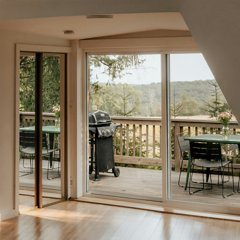 Porte escamotable et isolante en aluminium Luvindow