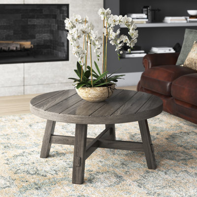 Bettee 4 Leg Round Cocktail Table