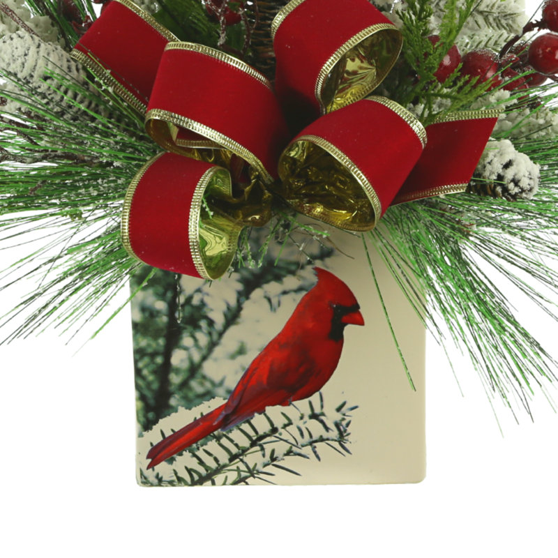 Snow Covered Greens And Berries In Cardinal Vase