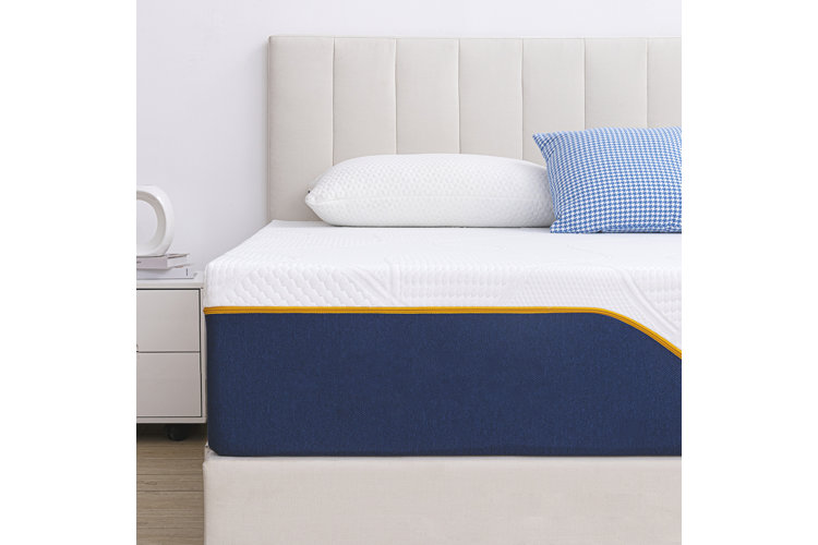 Memory foam mattress topped with memory foam pillow