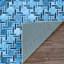 Tapis bleu à motif géométrique-847203144