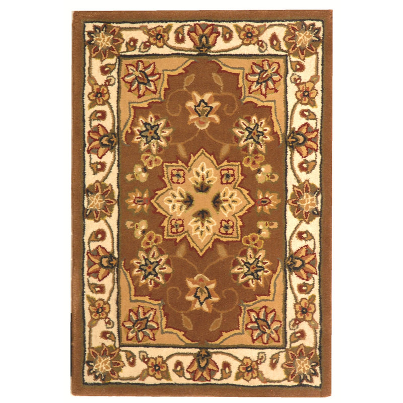 Handmade Tan and Ivory Tufted Wool Round Rug