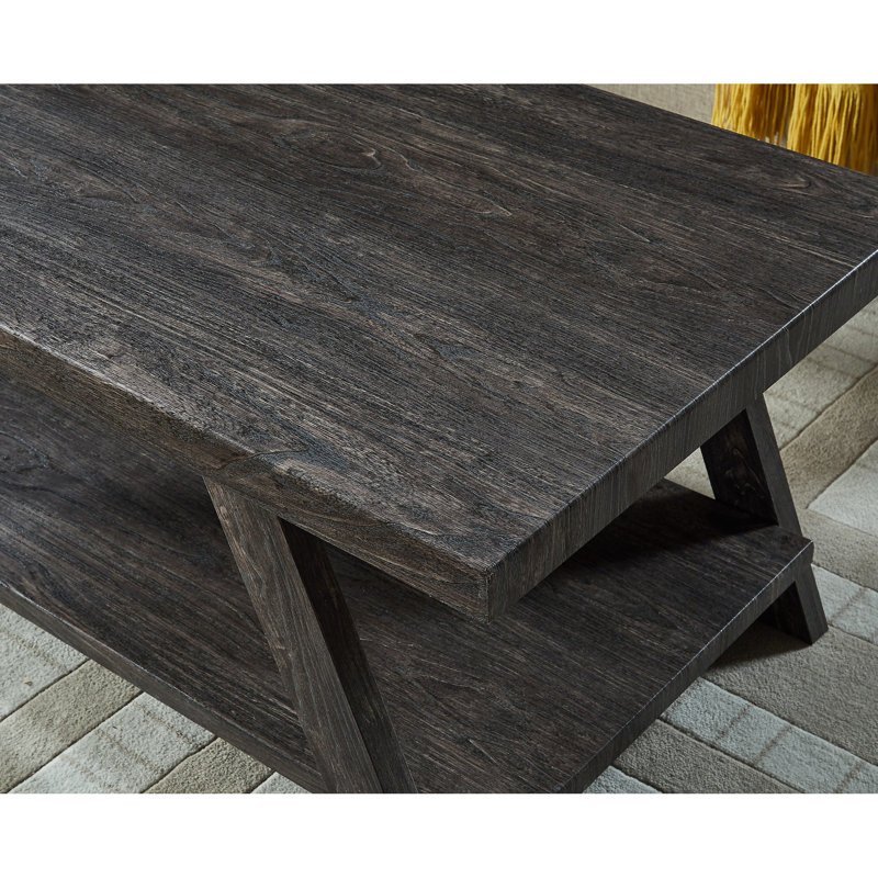 Table basse contemporaine en bois gris anthracite, espace de rangement supplémentaire et lustre aux pieds larges anthracite répliqué avec des pieds de tablette pour une pièce élargie