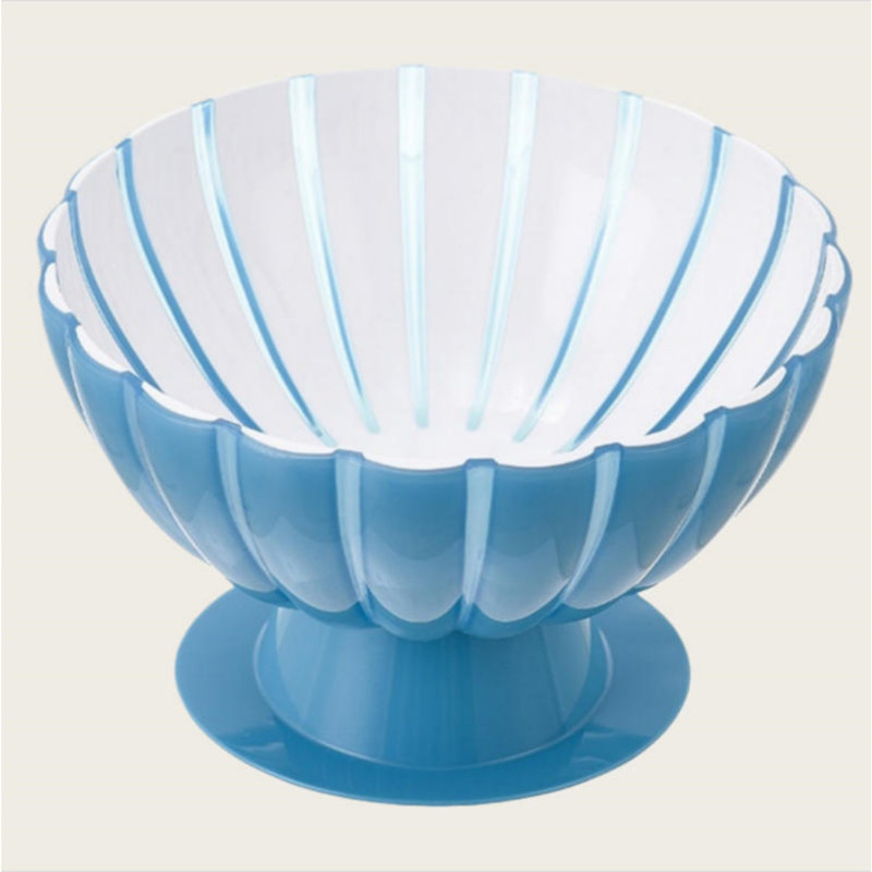 Blue petal-shaped fruit bowl with stand