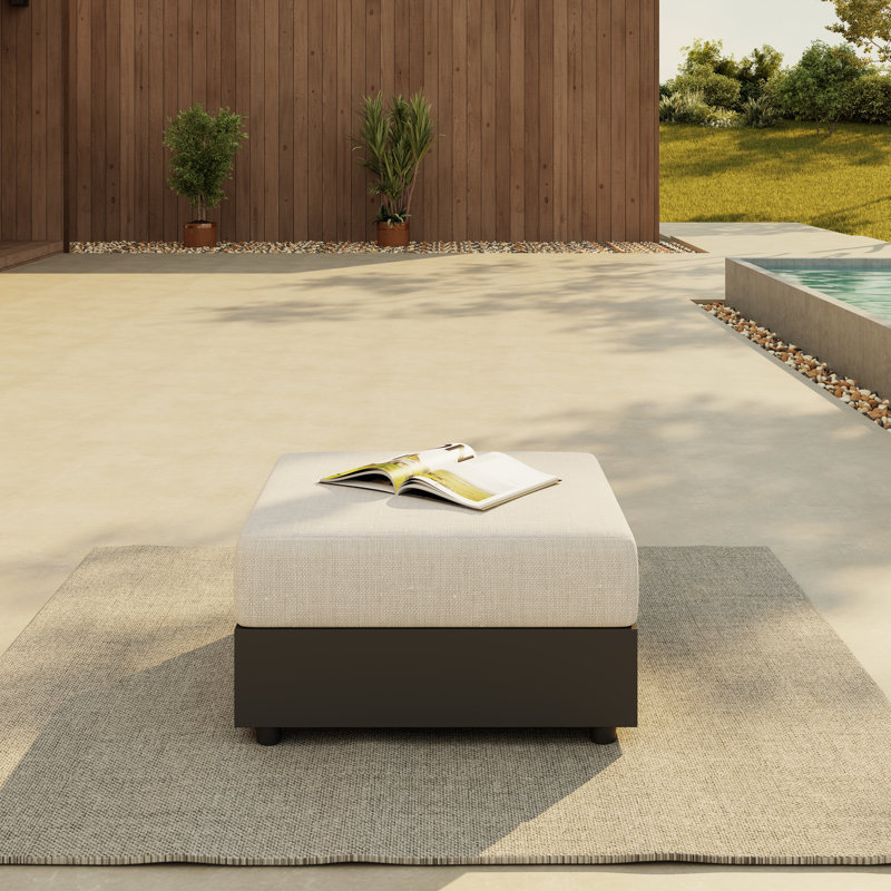 Repose-pieds d'extérieur avec coussin Zachery
