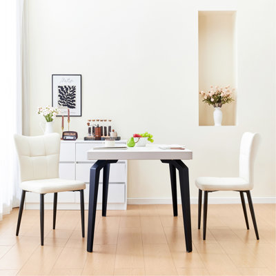 Ensemble de 2 chaises de salle à manger à haut dossier avec design ergonomique: structure en fer forgé, siège en cuir et coussins en éponge à rebond élevé