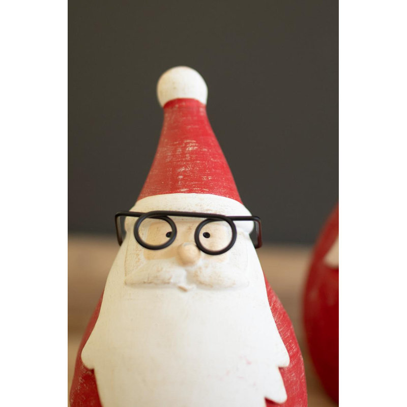 ENSEMBLE DE DEUX SANTAS EN CIMENT AVEC LUNETTES