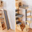 Structure d'escalade à hauteur réglable pour chat. Multi-niveaux. Fabriqué avec une planche multicouche en pin. Tapis en flanelle sur des tablettes pour le confort. La conception verticale économise de l'espace. Aucun perçage requis
