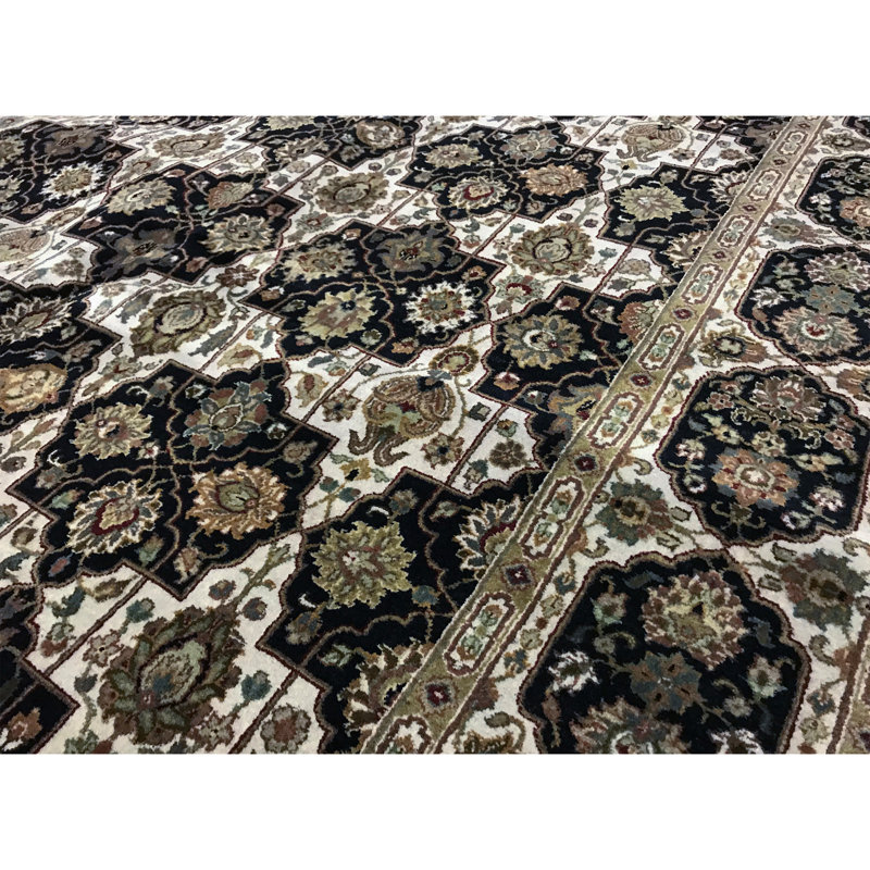 Lamani Wool Oriental Area Rug in Ivory/Black/Green