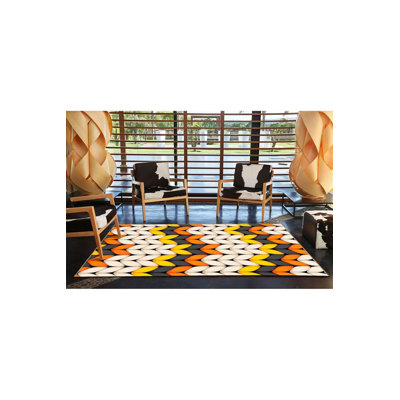 Tapis orange lavable à la machine à motif de trèfles à motif géométrique orange moderne