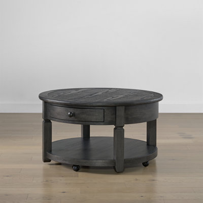 Brownstone Round Coffee Table With Storage