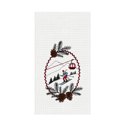 Piste de ski et sports d'hiver avec serviette de pommes de pin