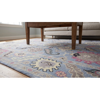 Tapis traditionnel bleu clair en laine noué à la main clair