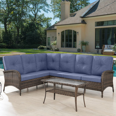 Serita Yokota 100" Wide Outdoor PE Wicker Patio Sectional With Cushions With Coffee Table