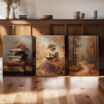 Ensemble de 3 affiches encadrées, décorations murales sur toile sur le thème de l'automne : pile de livres vintage avec feuilles d'automne, femme lisant dans les bois, chemin forestier. Décor rustique pour salon, chambre ou bureau. Prêtes à accrocher.