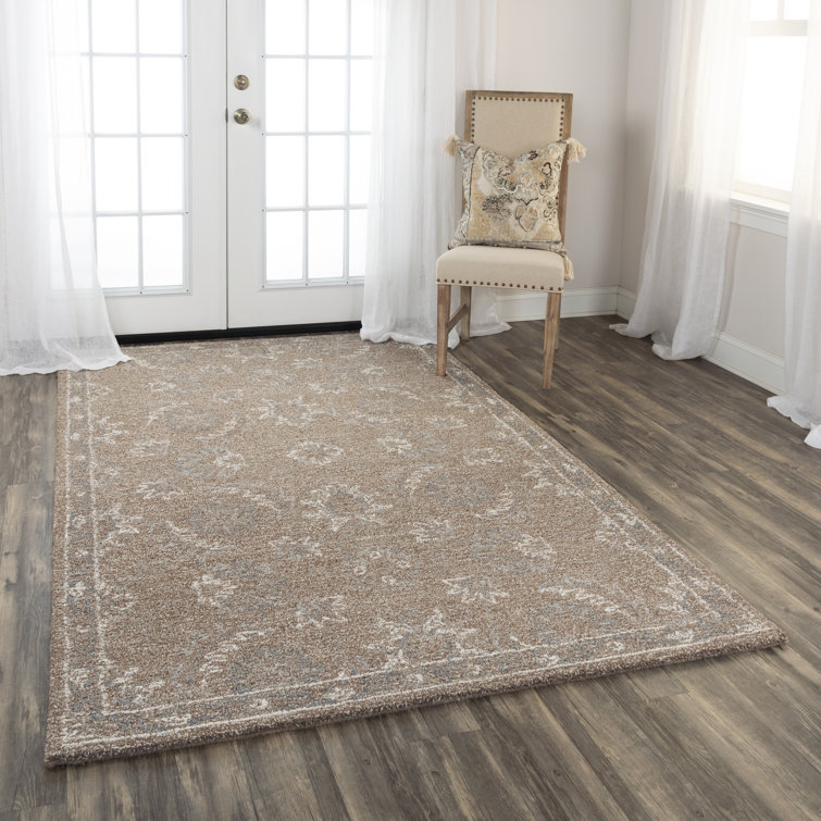 Tapis brun en laine à motif floral Hust