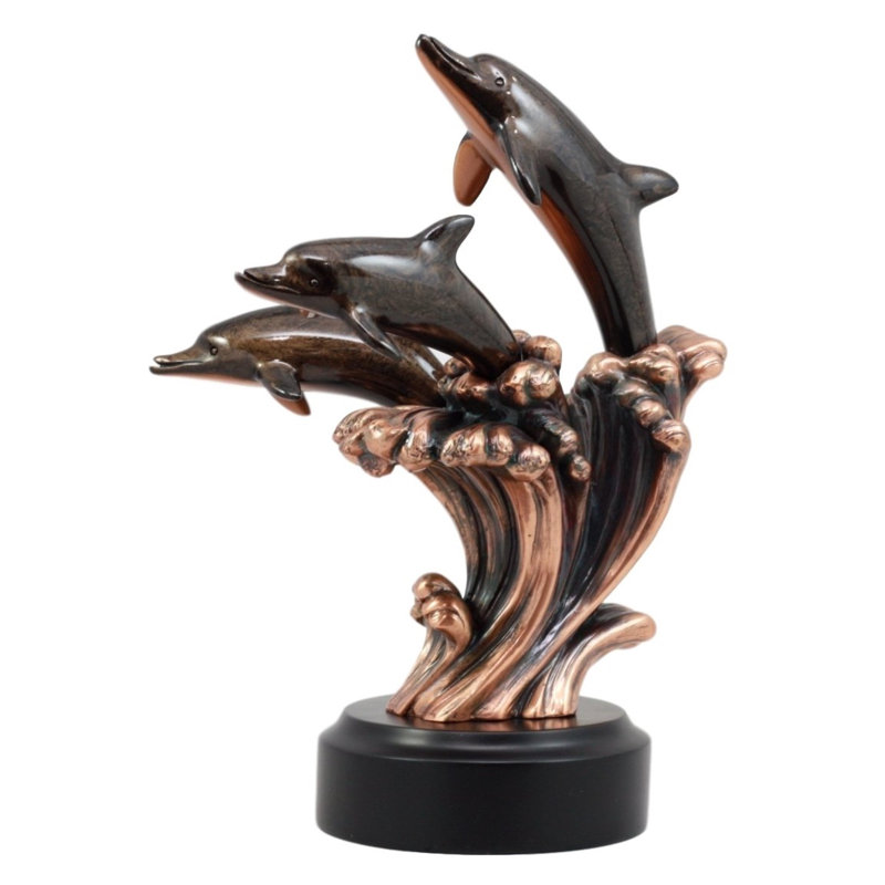 Figurine à trois bottlenoses de dauphins avec des ondes de l’océan Jayla
