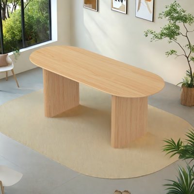 Atonia Oval solid wood dining table