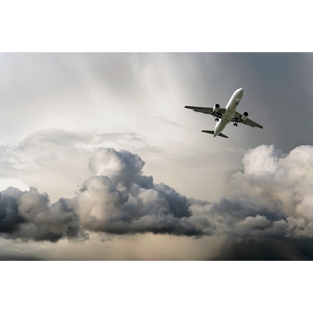 Leinwandbild Jet Airplane Landing In Storm von Sharply_done