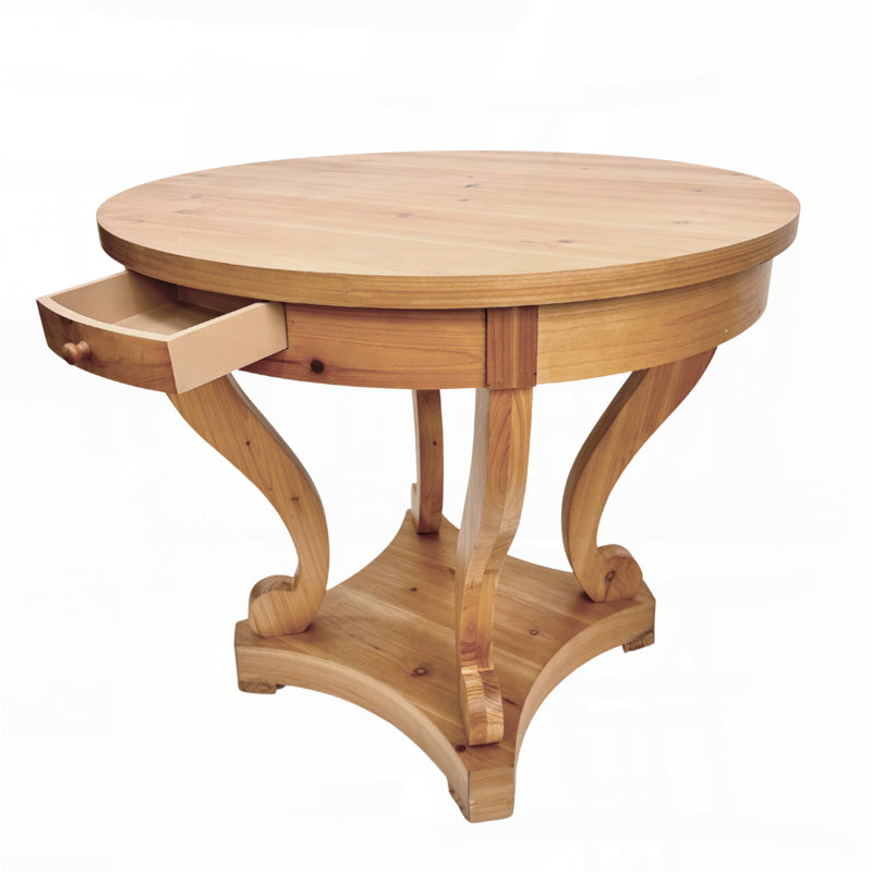 Petite table ronde à pieds courbés avec tiroirs de rangement