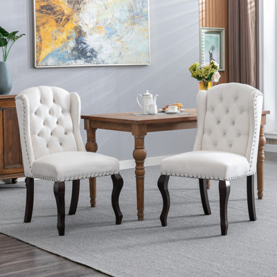 Jolynn Mid-Century Nailhead Trim and Tufted Upholstered Dining Chair