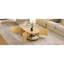 Table basse ovale cannelée avec 1 tablette et 2 portes de rangement ouvertes