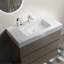 Meuble-lavabo élégant avec rangement spacieux et fonctionnalité silencieuse pour une salle de bain élégante et organisée.
