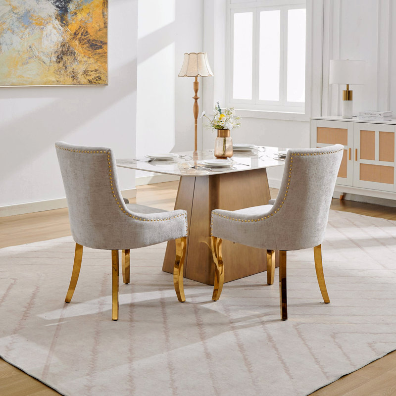 Chaises de salle à manger en chenille, style moderne avec pieds courbés plaqués or et garniture de rivet