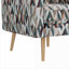 Fauteuil d'appoint Darien avec motif géométrique triangulaire et dossier capitonné