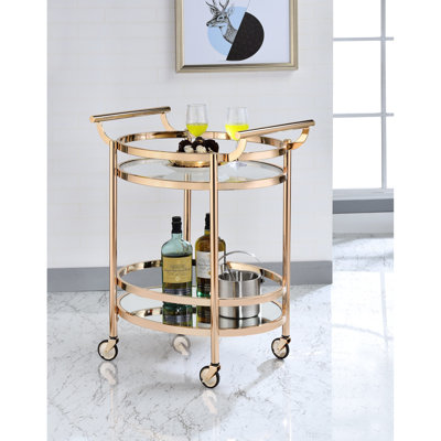 Verre transparent, or rose, chariot de service ovale, 2 tablettes de rangement ouvertes, tablette supérieure en verre trempé, cadre et poignées en métal à base de miroir, roulettes, construction, entretien des planchers recouvert de plastique, sans effort