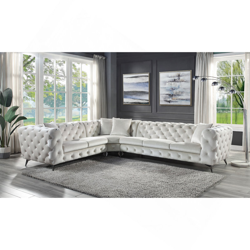 Canapé modulaire en tissu beige avec 4 coussins Atronia