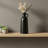 Minimalist Black Ceramic Vase, Slender Teapot Design, A Sophisticated Floral Arrangement For The Living Room Or Entryway.