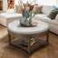 Grande table basse ronde à 2 niveaux avec repose-pieds capitonné-130087994